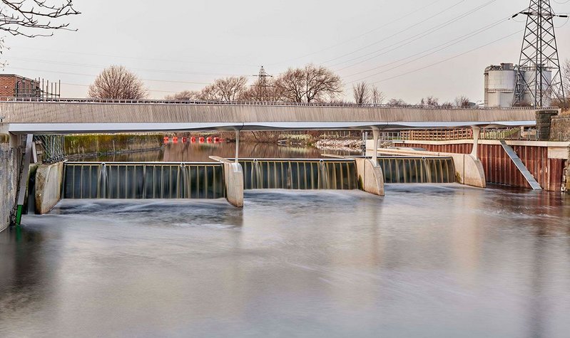 Industry, engineering and architecture combined – Knostrop Bridge hops across the new flood weirs.