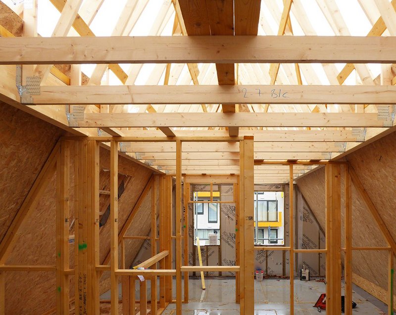 Top floor bedroom showing modular SIP panel construction at Ruff Architects' latest social housing scheme.