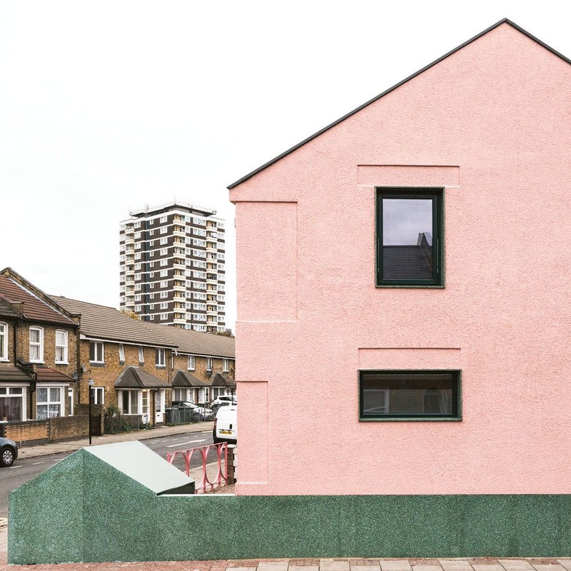 Salmen House seem from its gable end elevation, terrazzo forms the plinth and frames the windows.