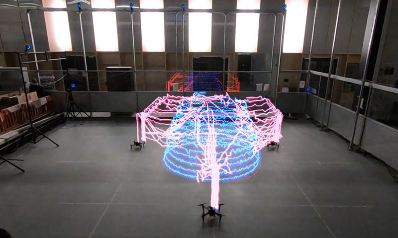 Timelapse light trace demonstrating multi-agent coordination of Aerial AM robot team.