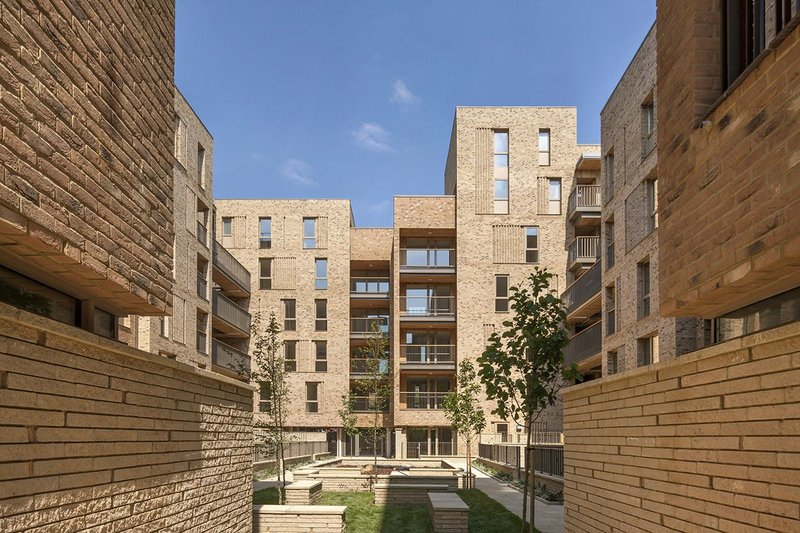 Royal Road housing with an attempt by Panter Hudspith to give more identity to the surfaces and spaces.