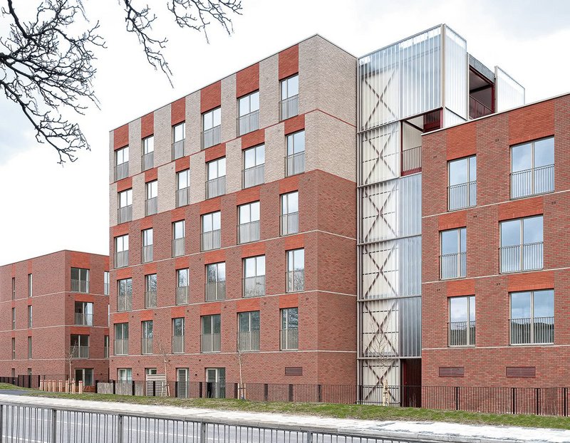 The crisp, pared-back aesthetic on display facing the Northern Relief Road remains deferential to existing housing.