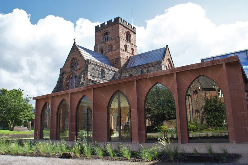 Feilden Fowles' red sandstone cafe pavilion at Carlisle Cathedral's medieval Fratry building.