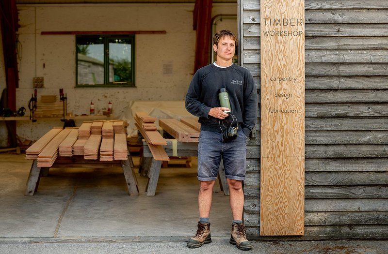 Thomas at the entrance to his workshops.