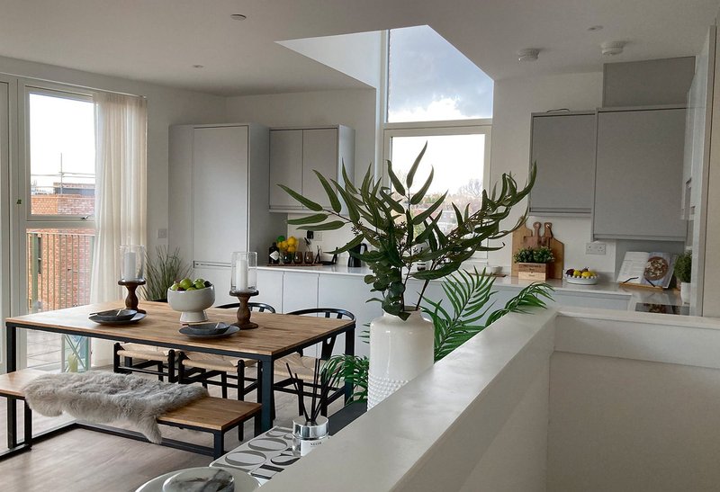 Dormers add character to top-floor kitchens in the south block.