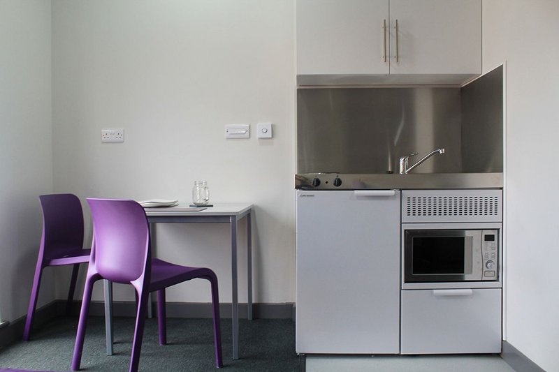 Elfin's Economy Plus at Poulson House student accommodation in Stoke: cooking, refrigerating, washing and storage in a single space-saving design.