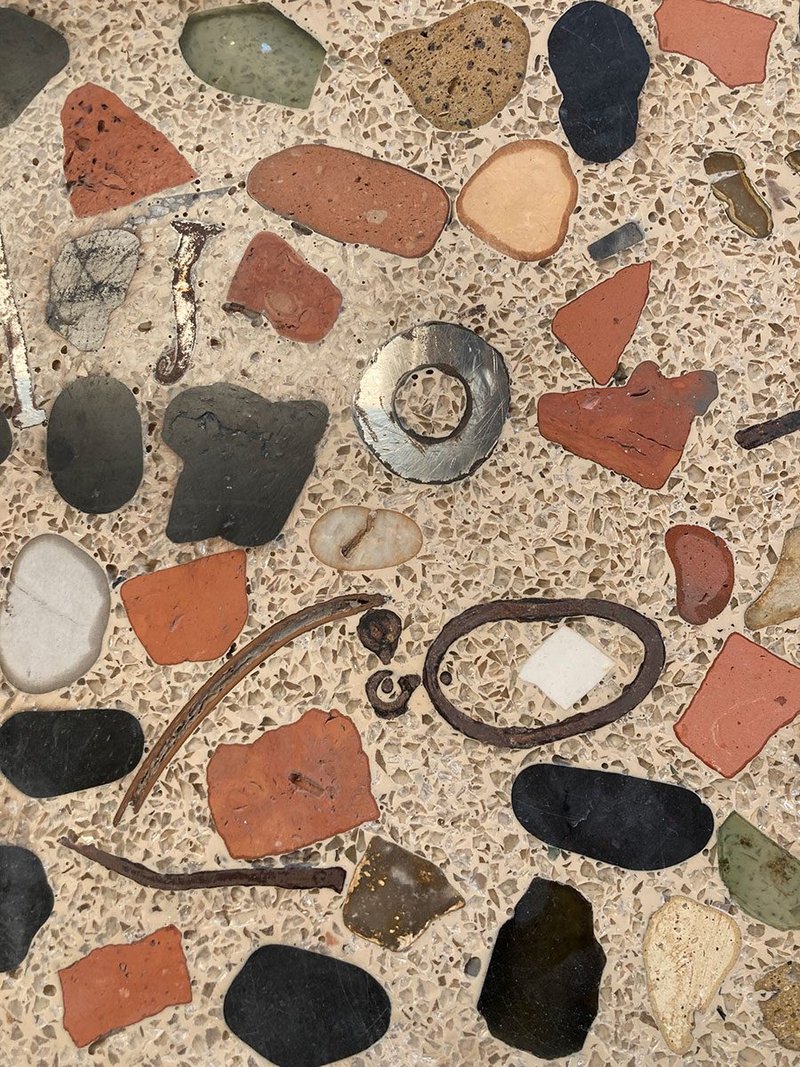 Examples of terrazzo made by Diespeker incorporating found objects such as nails and washers. Knox Bhavan hopes to use a similar idea at its House in Peckham.