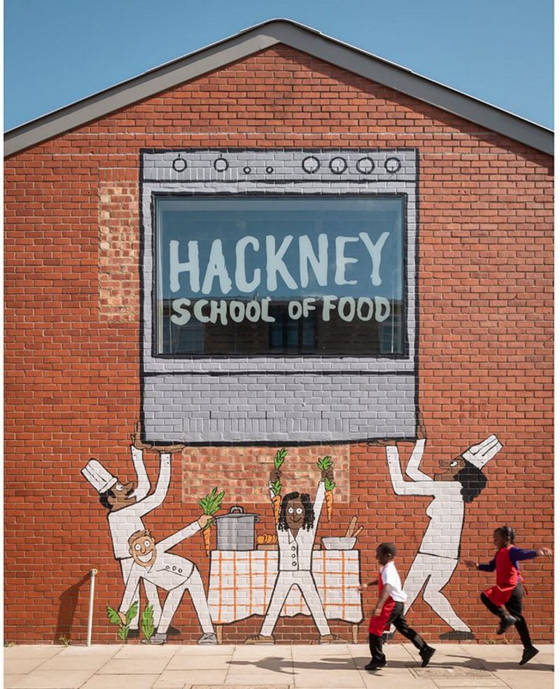Hackney School of Food, designed by Surman Weston in Hackney, north east London. The mural gives the community building a clear public presence.