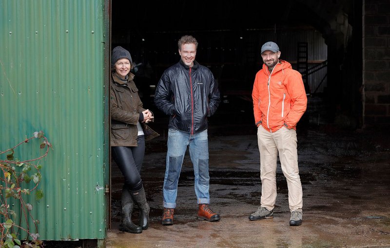 Sarah Featherstone and Jeremy Young of Featherstone Young flanking co-founder of the Black Mountains College, Ben Rawlence. They will use the slab of this barn as a basis for the teaching building.