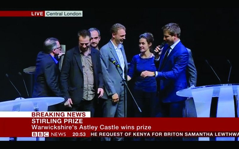 Live from the prize: Witherford Watson Mann and Landmark Trust director Anna Keay are congratulated by president Stephen Hodder (left) and presenter George Clarke (right).