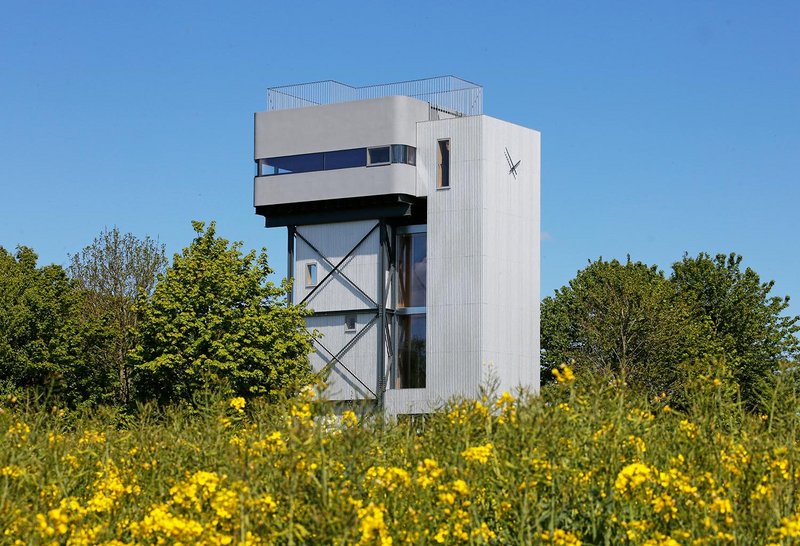 The timber stair tower not only supports itself but brings lateral stability to the steel tank structure adjacent.