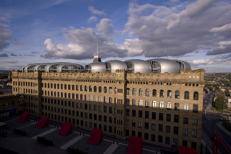 Lister Mills, Bradford by David Morley Architects and Price & Myers. The roof extension uses engineered timber for its light wight.