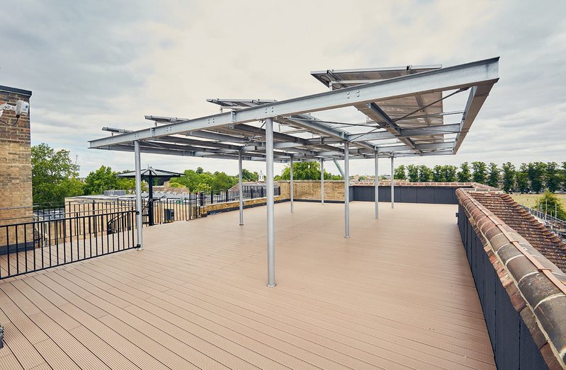 The steel PV canopy over the terrace was repurposed from a film set.