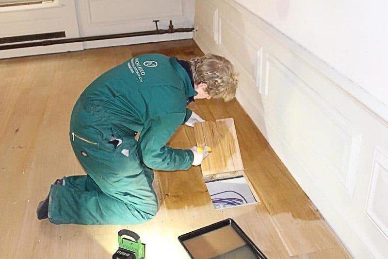 Timber restoration expert Vincent Reed restoring the oak floor of the King’s State Apartments at Kensington Palace.