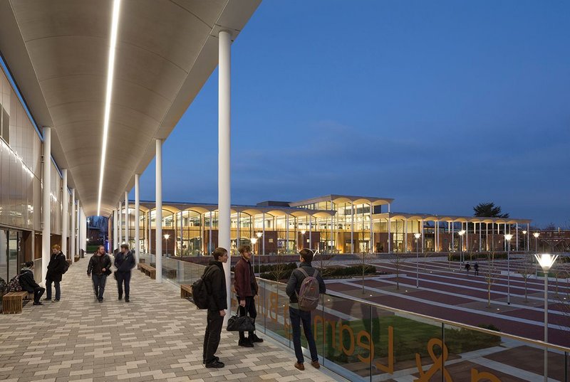 Precast concrete vaults define the buildings and extend to form the colonnades: one is extruded along the terrace of the teaching block.