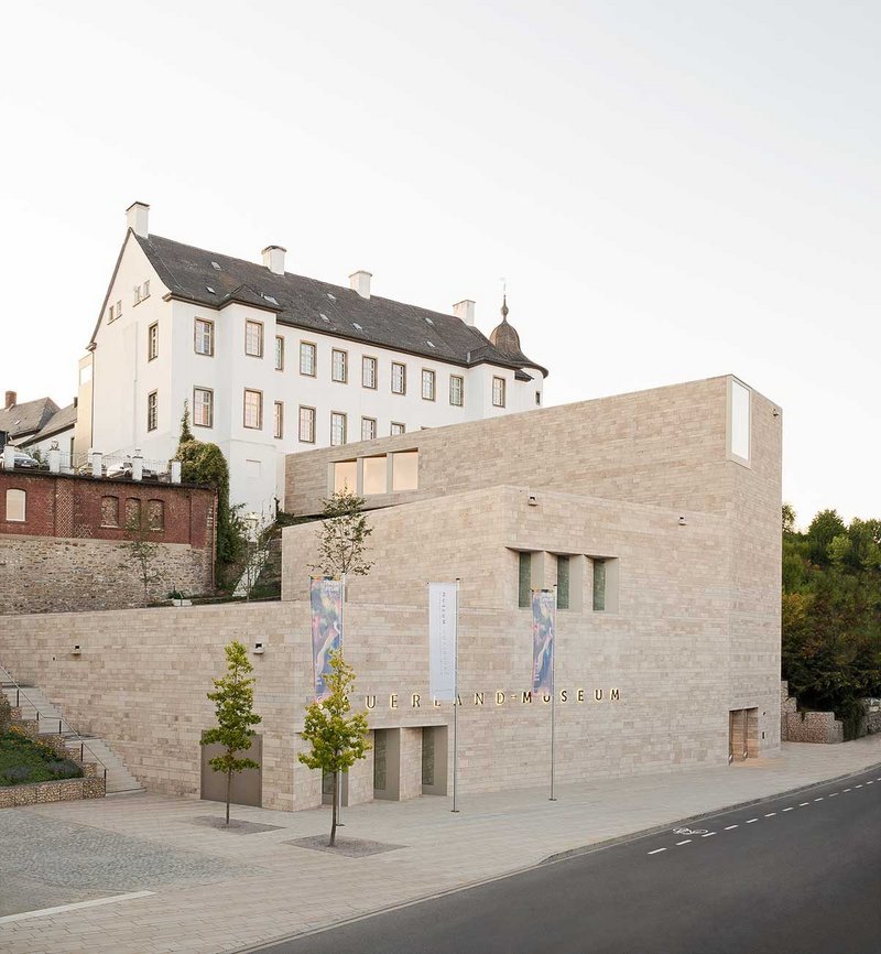 Sauerland museum’s monolithic, travertine-clad new building feels as much part of the landscape as it does an extension to the original.