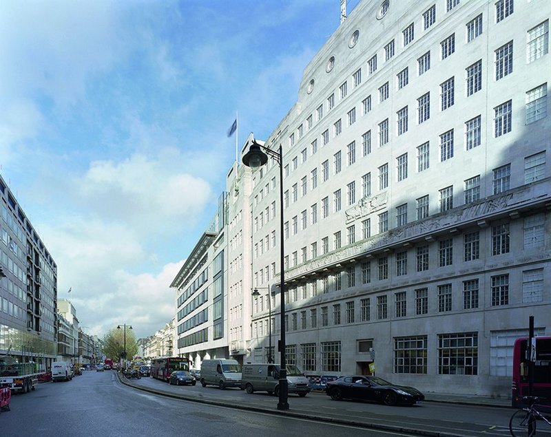 The delicate metal-framed windows of the 1931 Broadcasting House on Portland Place with the extension beyond.