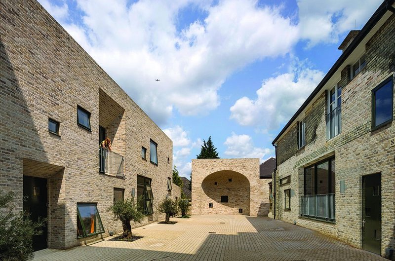 A new courtyard, formed at the rear with a mixture of new and old accommodation, is the heart of the new training and employment advice facility.