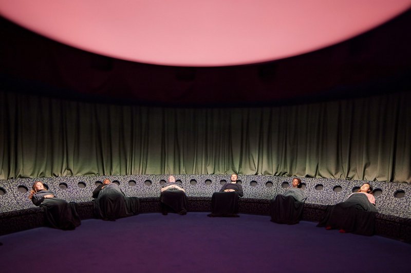 Dreamachine. Speakers set into the seats create the auditory experience. The oculus in the centre distracts from the tech rig in the ceiling