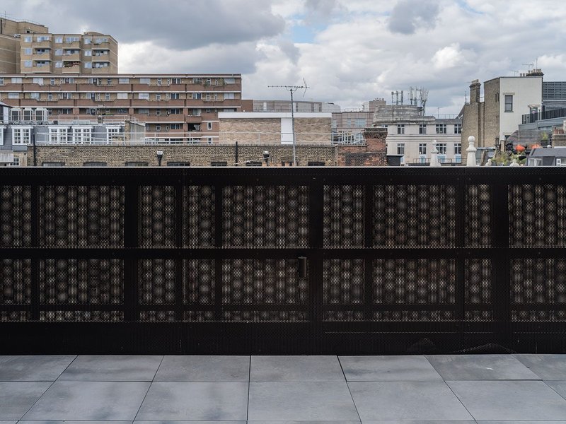 Balustrade to a new terrace overlooking the narrow access road to Bleeding Heart Yard.