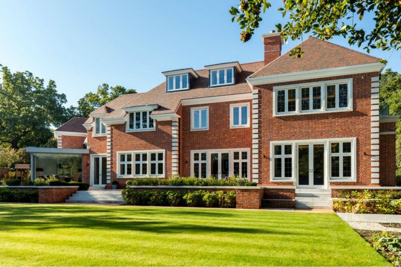 Kingston upon Thames new-build featuring Lomax + Wood made-to-order timber casement windows and French doors.