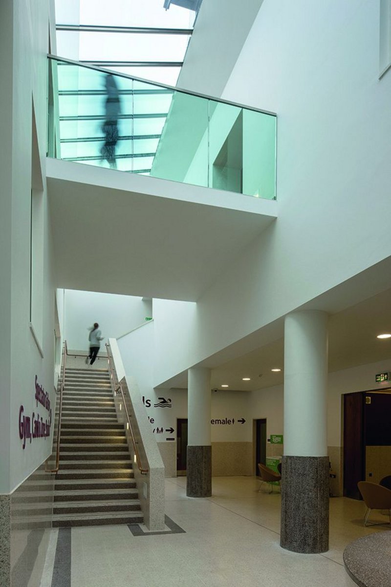 Hard-wearing terrazzo gives a tough yet warm feel to the entrance foyer.