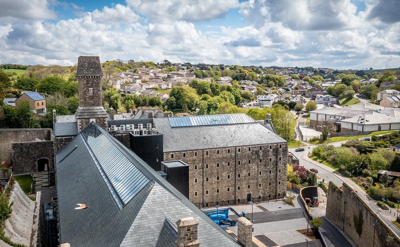 Twelve Architects' redevelopment of grade II listed 18th-century Bodmin Jail included the specification of SSQ Riverstone phyllite slates and Velux glazing panels.