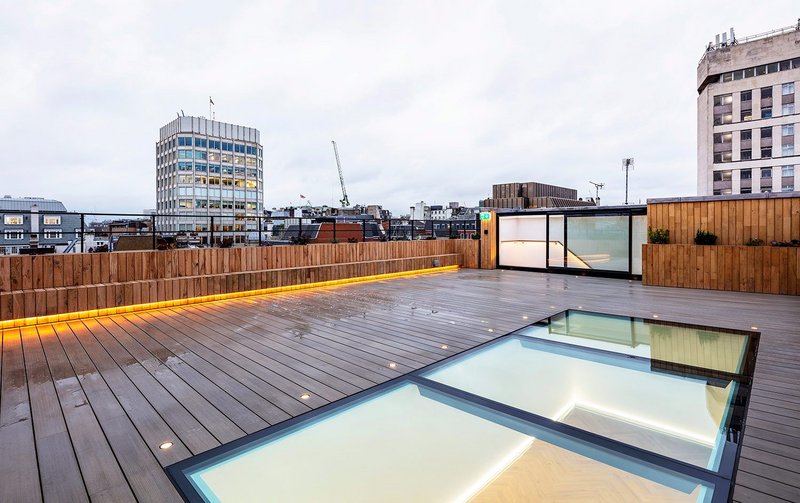 Perfect partners: Glazing Vision's Three Wall Box and Flushglaze Walk-on Rooflight expand space and light at the Duke Street St James's offices in Piccadilly, London.