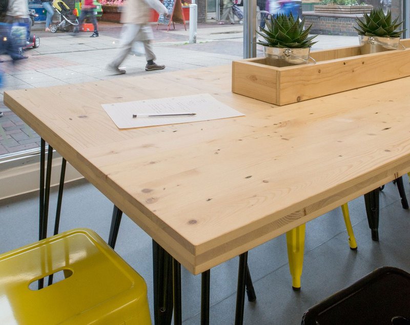 Prototype CLST panels in use as table tops at Poplar’s Chrisp St Exchange co-working space.