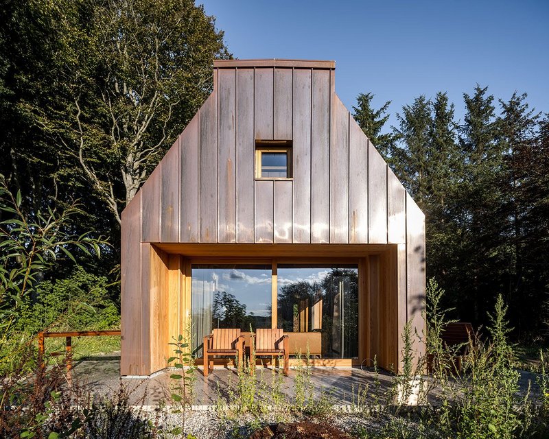 The rather more majestic apex-end elevation of the house that looks over the landscape.