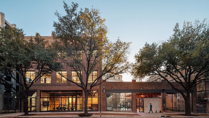 Lake|Flato’s headquarters in San Antonio, Texas, repurposed from a 100-year-old building using sustainable technology.