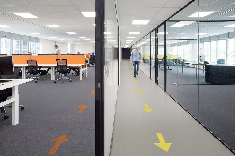 Walk this way: Forbo's Tessera Layout carpet tiles (left) and Marmoleum sheet flooring (right) can both be specified with directional arrows.