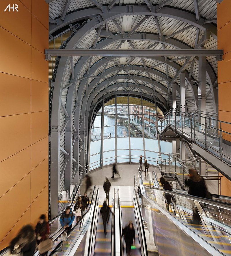 Passengers have views of the exposed diagrid steel structure as well as the River Aire as they travel on the escalators.