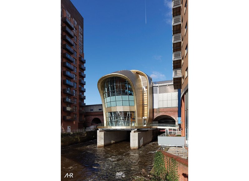 A steel structure was the only way to achieve the distinctive hooded form of the new entrance within the restricted site.