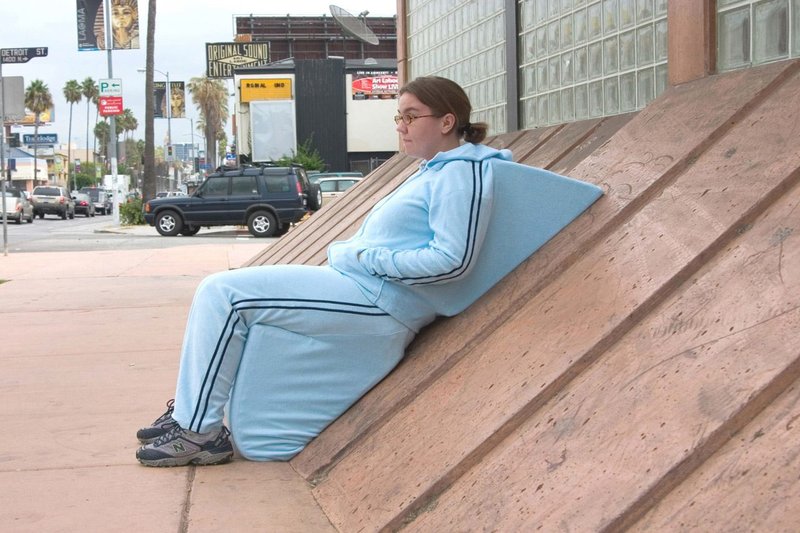 ‘Archisuits’ by Sarah Ross enable the wearer to sit comfortably on hostile architecture – features such as slopes and spikes designed to deter people from sitting on or interacting with a building.