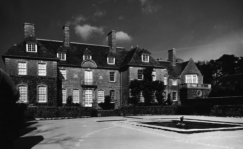 Conkwell Grange’s formal side faces east across Wiltshire.