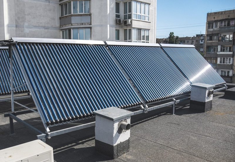 Active attempts to reduce buildings’ energy consumption- such as solar thermal-are being abandoned in favour of offsetting.