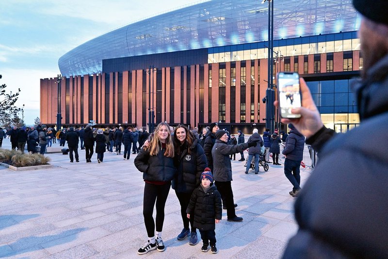 For night games  the silver top section is  lit in Everton blue.
