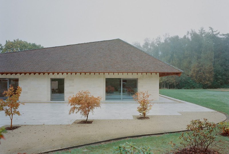 The roof’s varying ridge height provides shade and shelter.