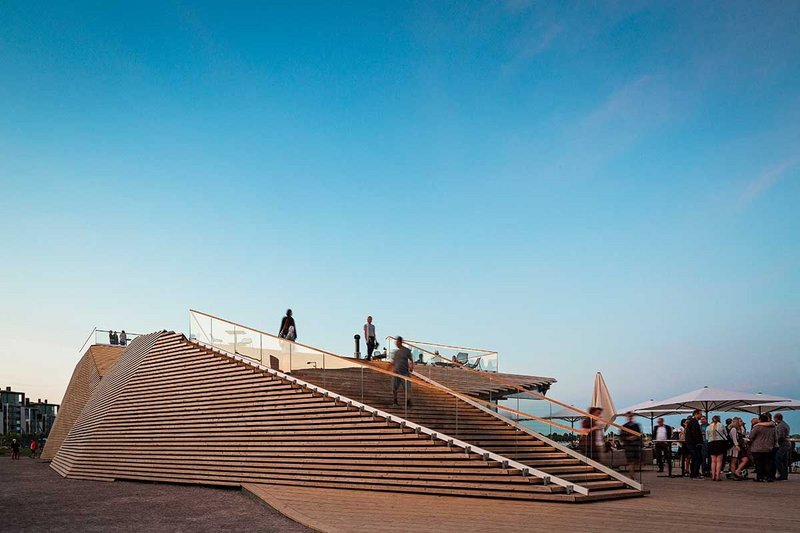 A result of building regulations, the ‘tail’ leads  on to the rooftop terrace.