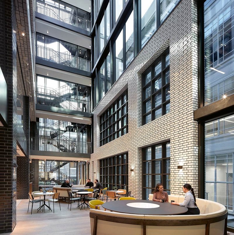 CBRE Henrietta House offices, London, by MoreySmith – an example of peoplecentred retrofit. The impressive atrium was formed from an unused void over a loading bay.