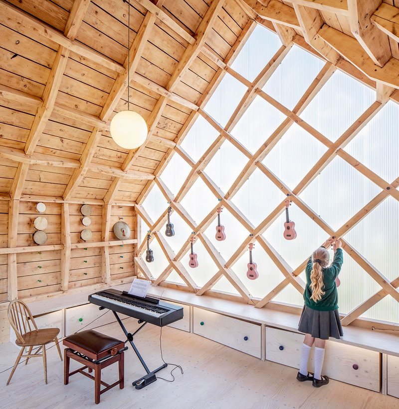 Interior of St. John's School Music Pavilion, designed by Clementine Blakemore Architects at Lacey Green, Buckinghamshire. Completed in 2019, the second phase of the project enclosed what was previously an outdoor classroom.