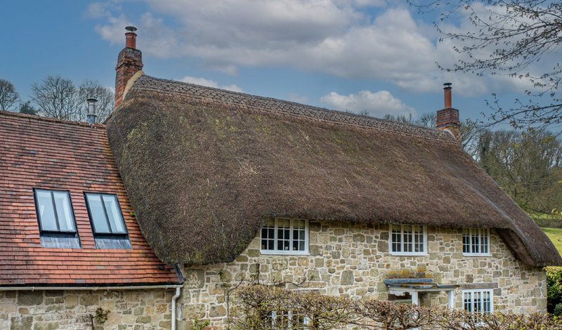 High-spec design with a traditional look and feel. The Rooflight Company's Conservation Rooflights at Frog Pond Cottage, Salisbury, Wiltshire.