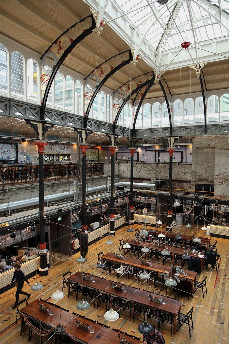 Brightly coloured pillars and a reclaimed gym floor keep things informal and comfortably quirky against the brick of Mackie Mayor’s old building.