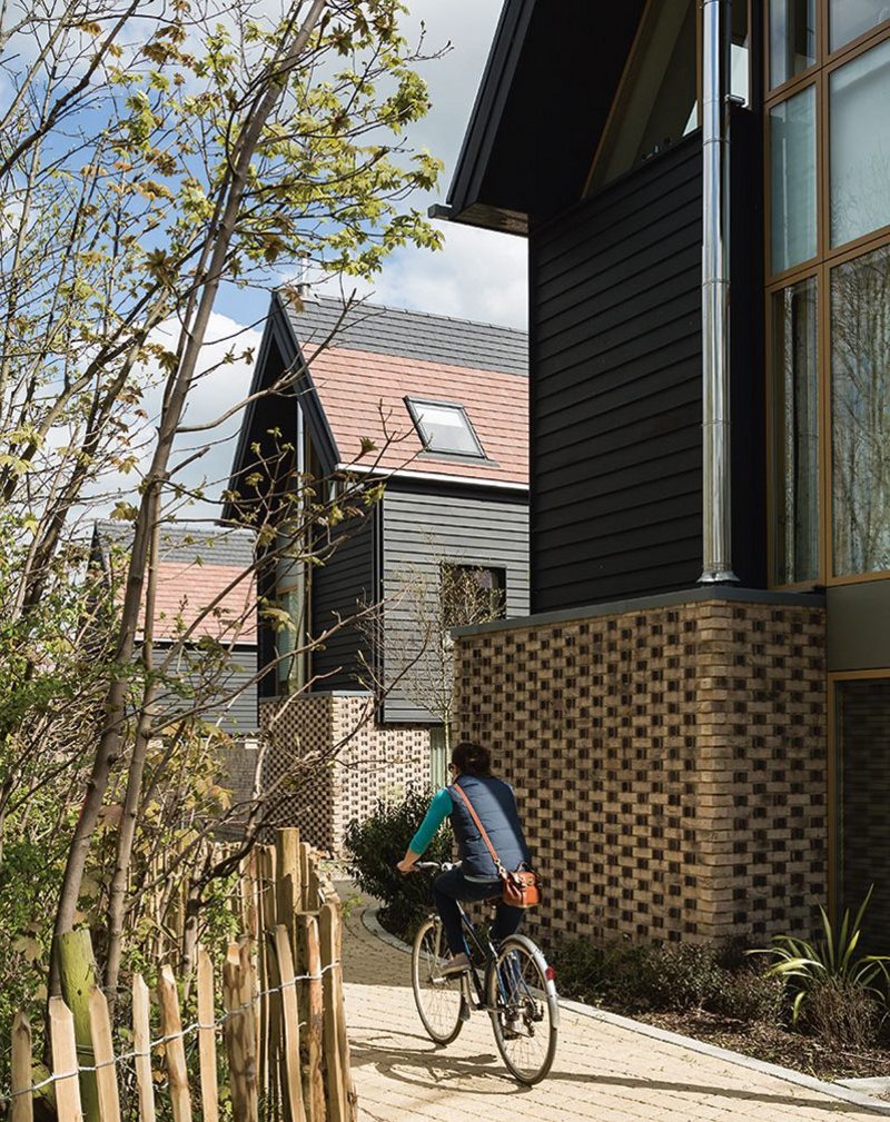 Houses at Abode, at Great Kneighton in South Cambridge, turn gable ends onto green lanes, reflecting historic burgage plots.