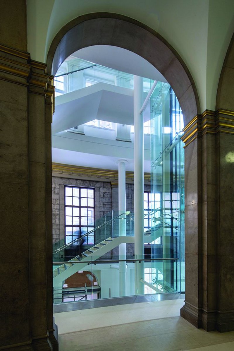 Gold leaf and Portland stone lead to the glass and steel of the vertical circulation core.
