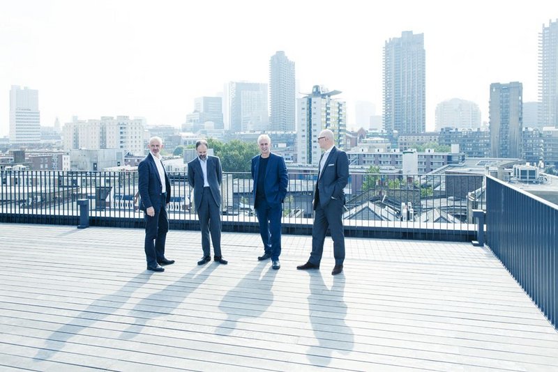 Our city: from on top of the office Peter Morris, Jonathan Hall, Paul Monaghan and Simon Allford.