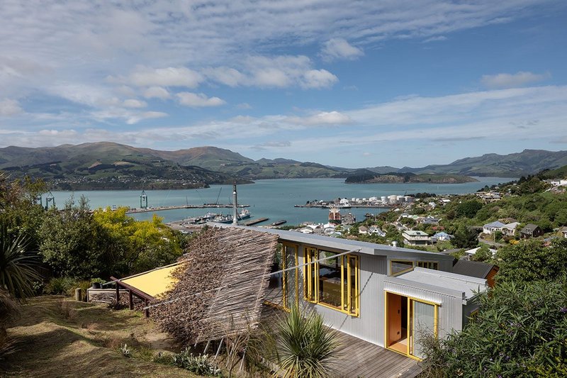 The plywood pavilion opens to both sky and harbour.