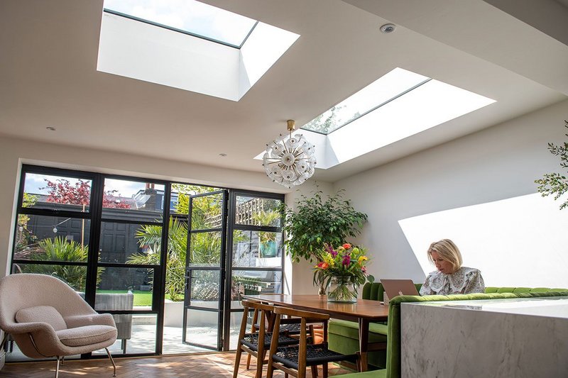 Beyond the ordinary: Bespoke rooflights, such as the rectanglular and square variants from Vario by Velux, breathe life into communal areas, including dining and kitchen spaces.
