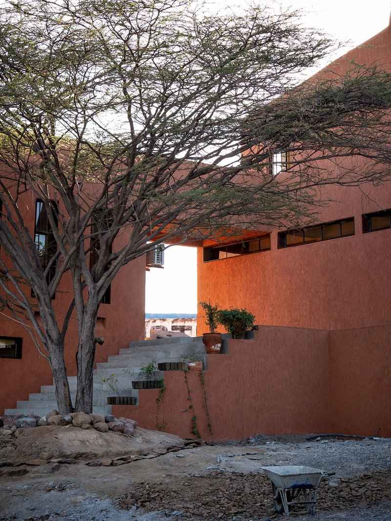 Walkways, stairs and terraces connect the buildings.